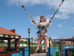 Zoe on a bungy trampoline